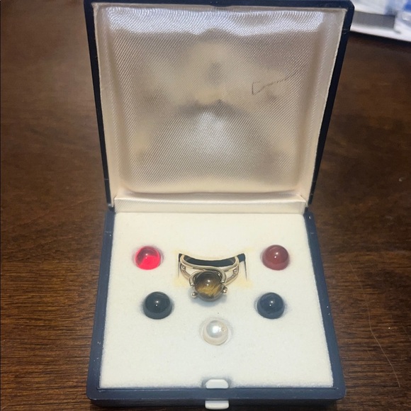 Elegant Gold and Black Stone Ring in Box